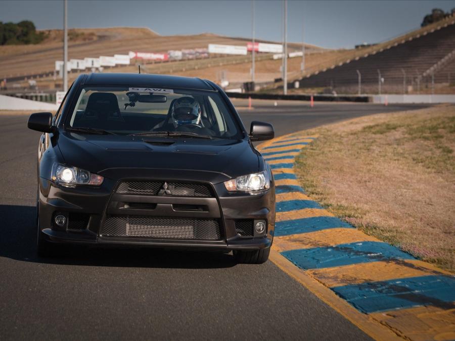  Mitsubishi Lancer Evolution X SE 2009 года  (US) (фото 2 из 11)